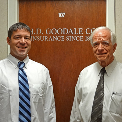 Photo of John Keating and F. Anthony Keating in front of the H.D. Goodale Co office door